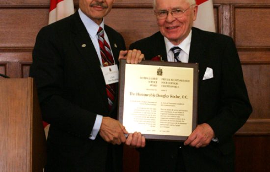 The Honourable Don Boudria, Acting Chair of the Canadian Association of Former Parliamentarians and
2009 Distinguished Service Award recipient, the Honourable Douglas Roche.